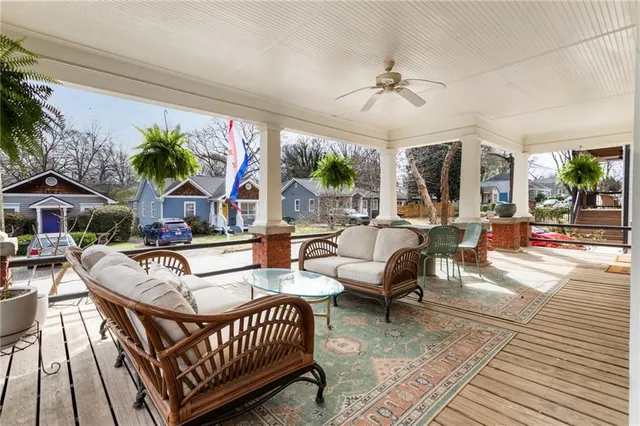 a view of a patio with couches table and chairs