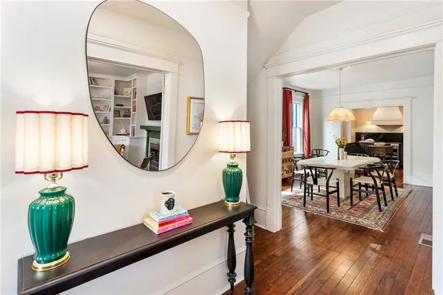 a room with furniture and wooden floor