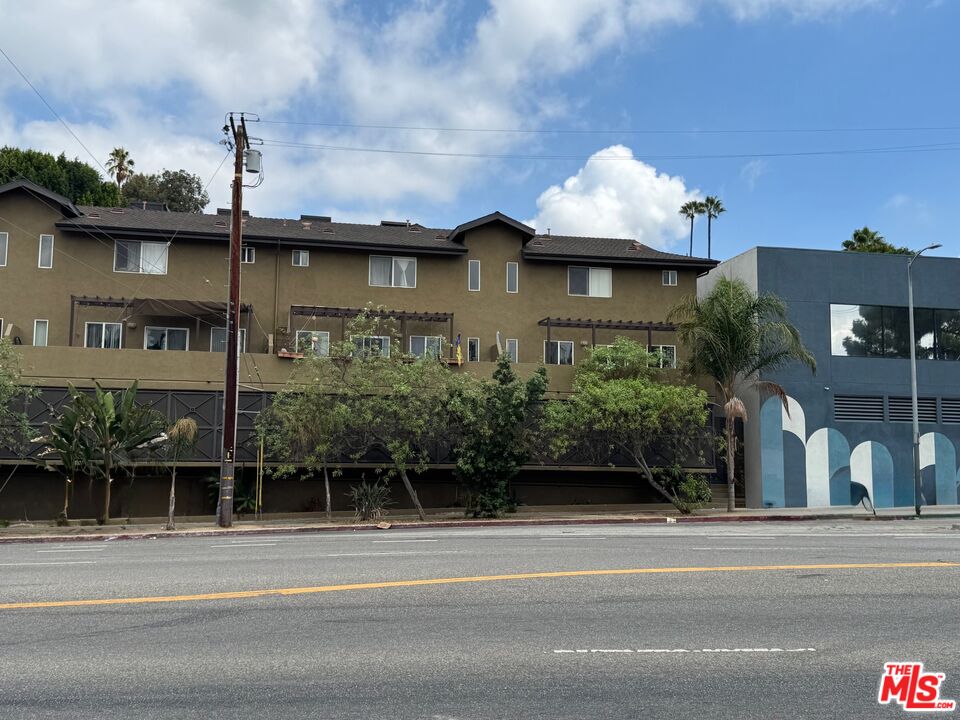 1312 Quintero Street, Unit 11 Los Angeles, CA 90026 - Photo 1 of 16 a view of a house with a balcony