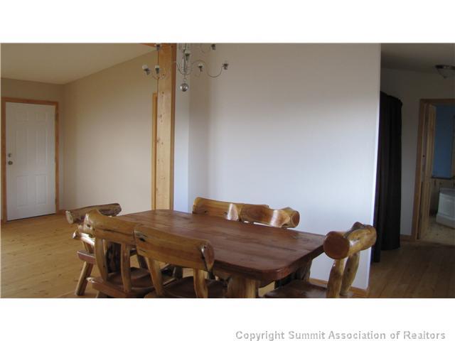 1723 Campfire Road Hartsel, CO 80449 - Photo 4 of 9 a kitchen with a table and chairs