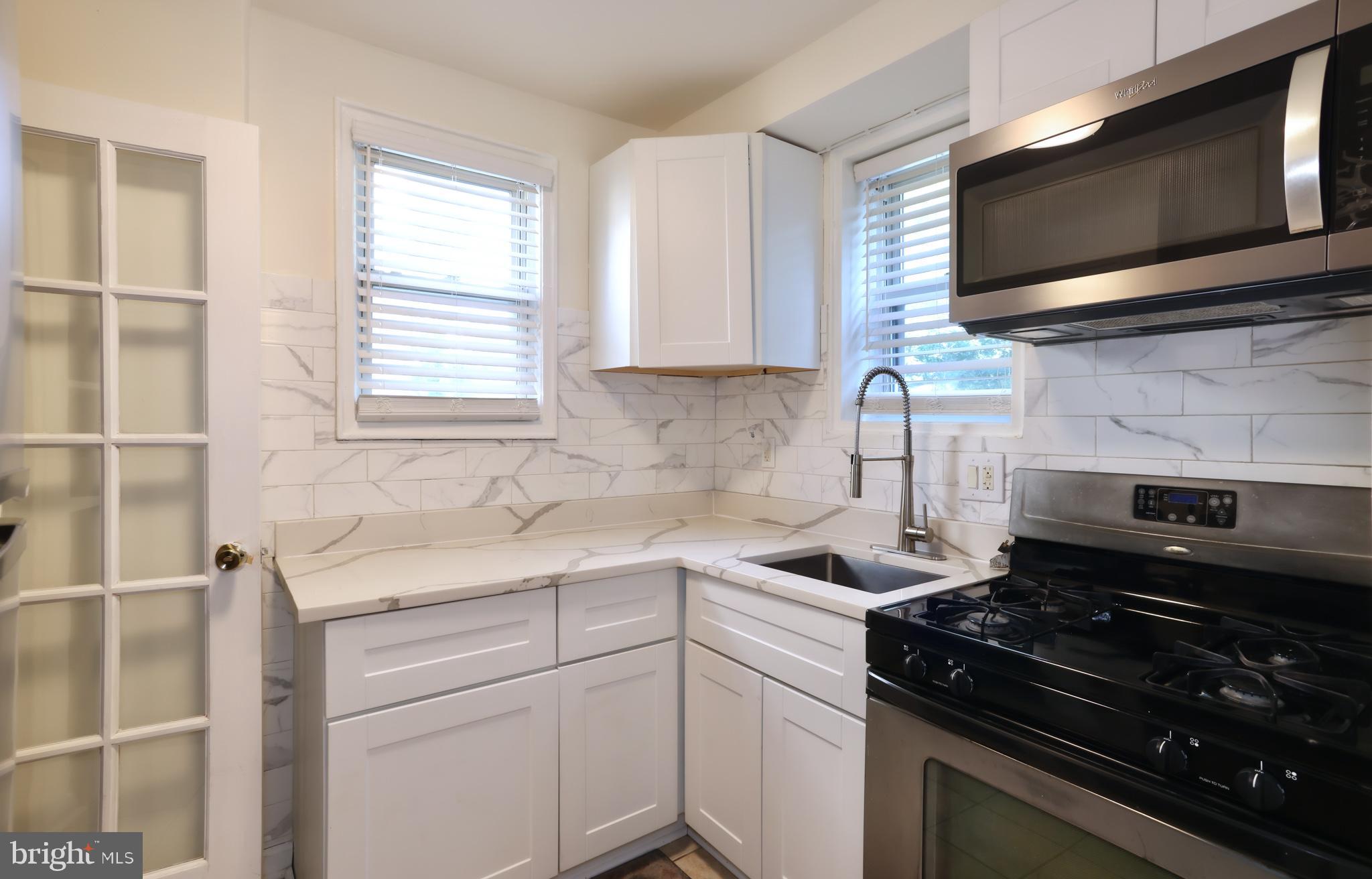 5424 B Street Southeast Washington, DC 20019 - Photo 20 of 28 Kitchen with Built in Microwave