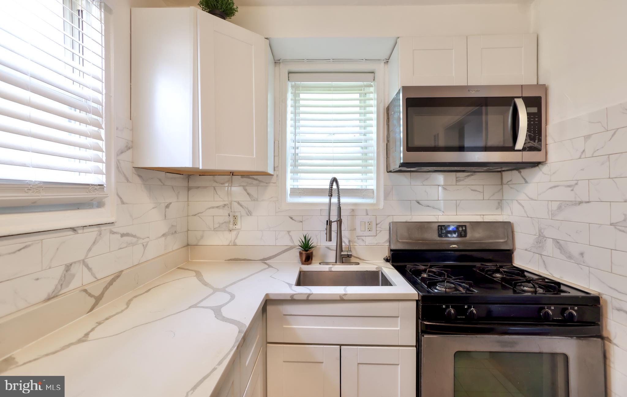 5424 B Street Southeast Washington, DC 20019 - Photo 6 of 28 KITCHEN WITH BUILT-IN MICROWAVE