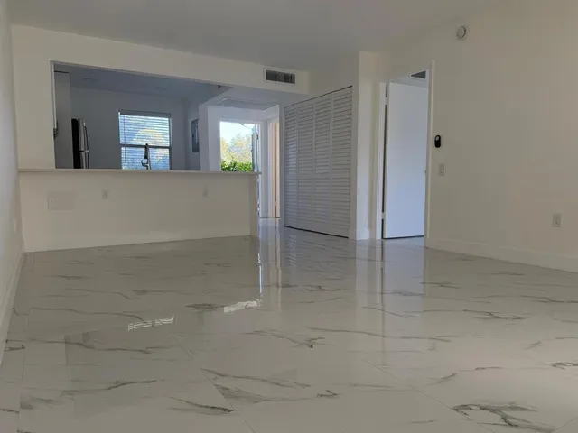 $120,000 | 9301 Lime Bay Boulevard, Unit 102, Tamarac, FL 33321