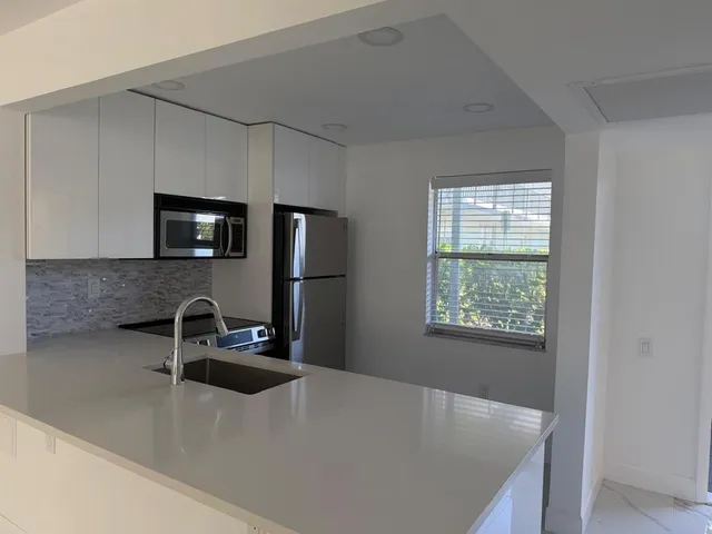 $120,000 | 9301 Lime Bay Boulevard, Unit 102, Tamarac, FL 33321