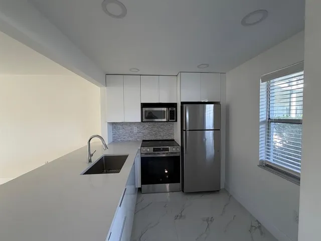 $120,000 | 9301 Lime Bay Boulevard, Unit 102, Tamarac, FL 33321