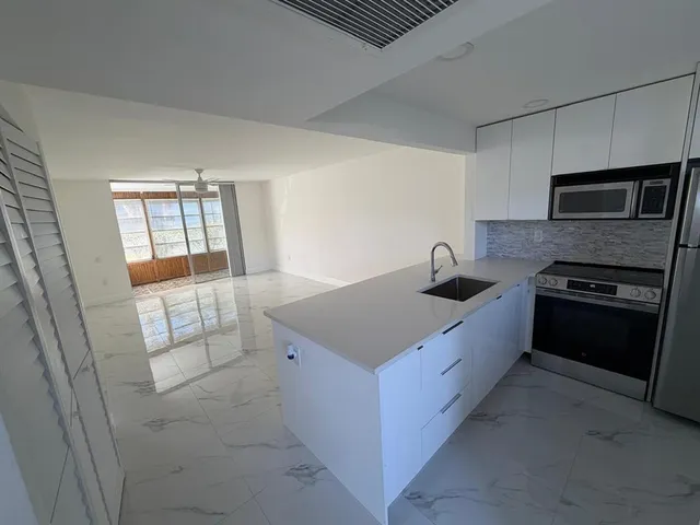 $120,000 | 9301 Lime Bay Boulevard, Unit 102, Tamarac, FL 33321