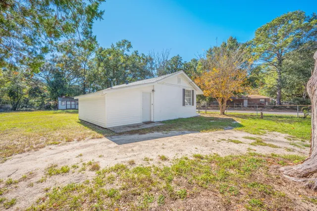 a view of a outdoor space with swimming pool