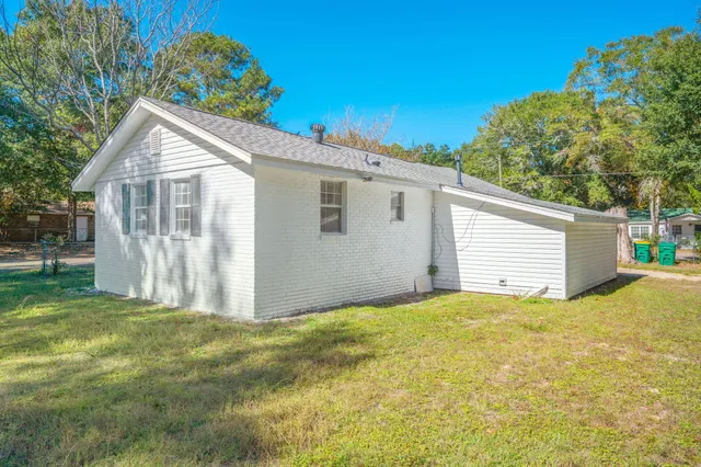 a view of backyard of house