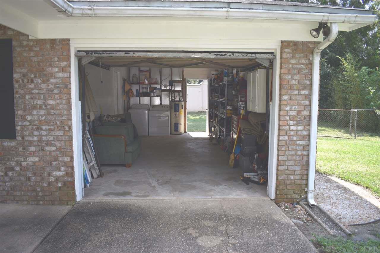 115 Craft Street Pensacola, FL 32534 - Photo 6 of 24 One car garage with laundry hook ups inside.