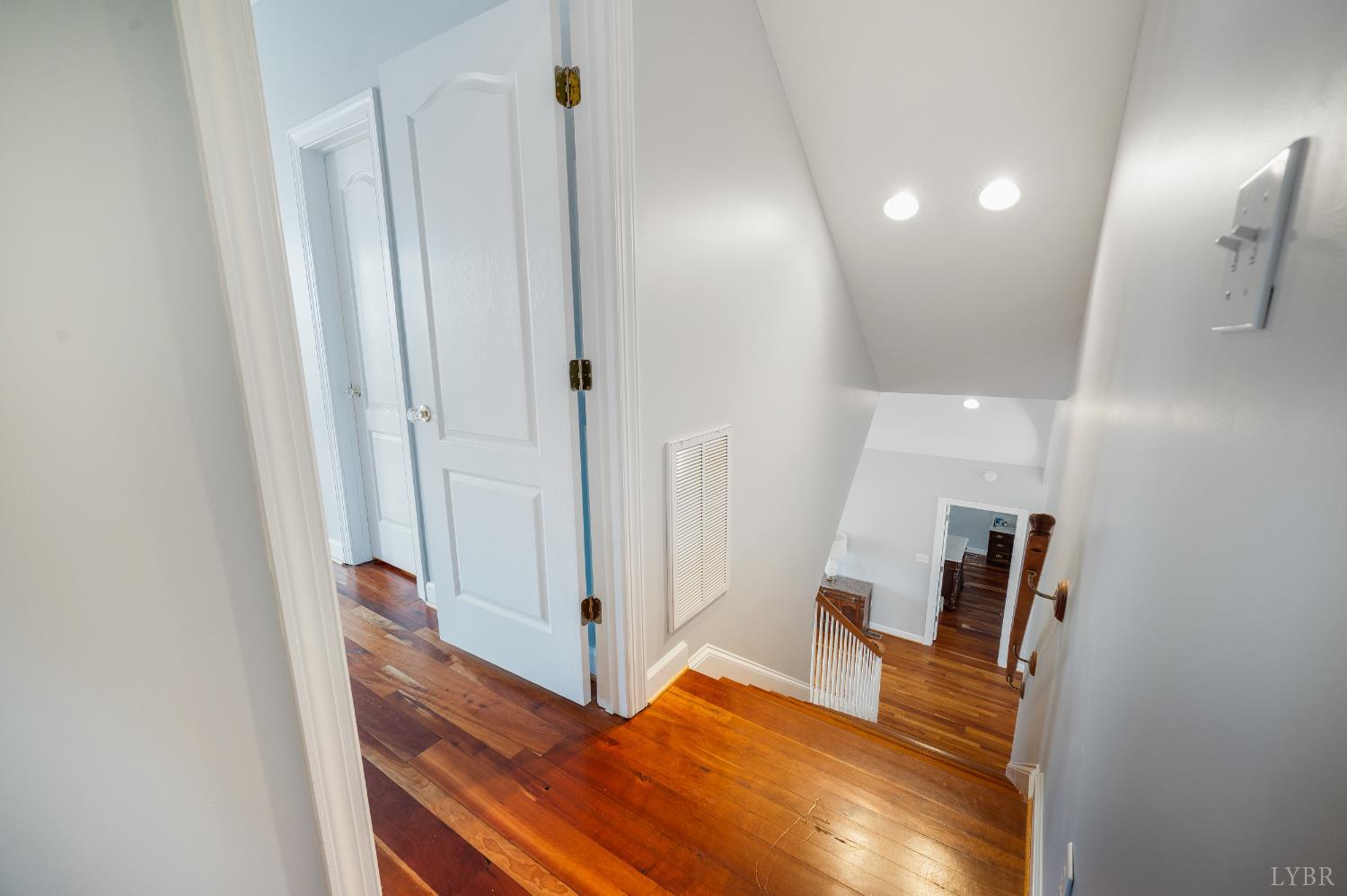 216 Burford Farm Road Monroe, VA 24574 - Photo 37 of 80 a view of a hallway with entryway wooden floor and front door