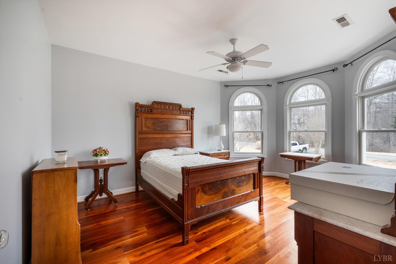 216 Burford Farm Road Monroe, VA 24574 - Photo 44 of 80 a bedroom with a bed and wooden floors