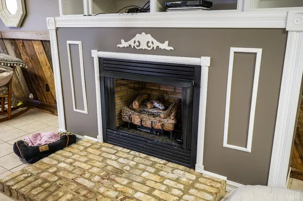 a view of a bathroom with a sink and a mirror