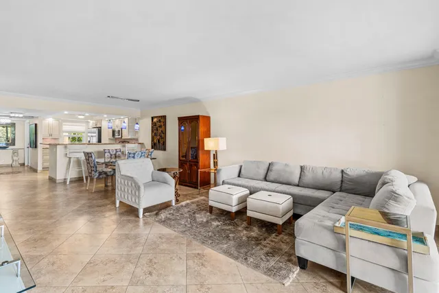 a living room with furniture and a table
