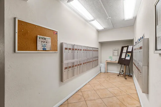 a view of a hallway with workspace