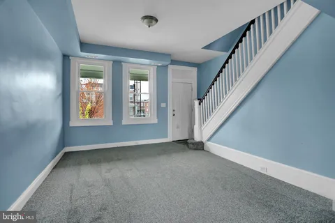 a view of an empty room with window