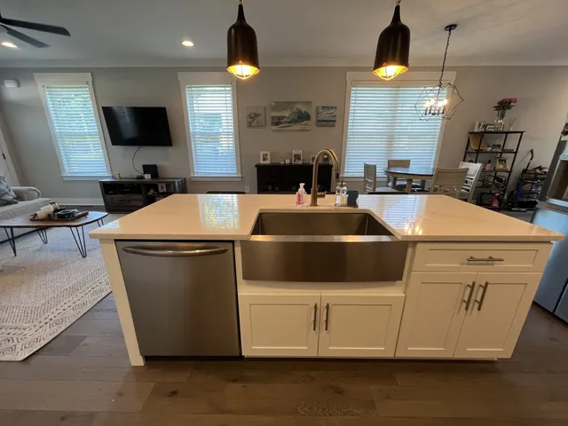 a kitchen with a stove and a microwave
