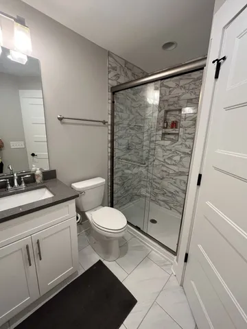 a bathroom with a sink and mirror