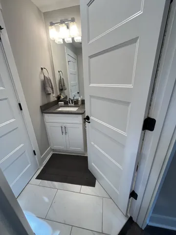 a bedroom with bed and window