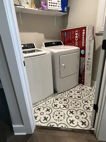 a view of a wooden chair and a small deck