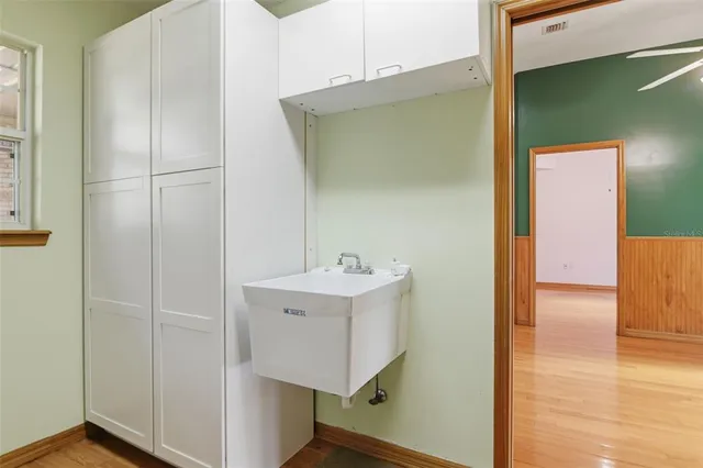 a bathroom with a sink and mirror