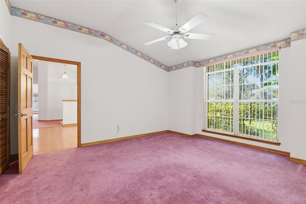 2409 South Spring Garden Avenue DeLand, FL 32720 - Photo 9 of 26 a view of an empty room with a window