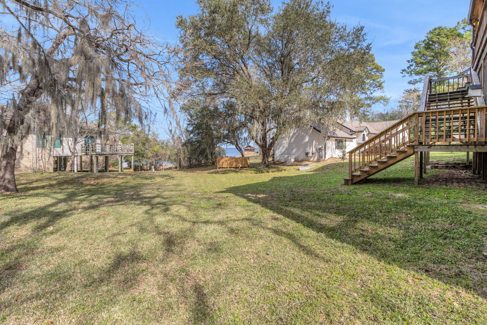 171 Kings Way Coldspring, TX 77331 - Photo 38 of 50 View of the back yard and lake beyond
