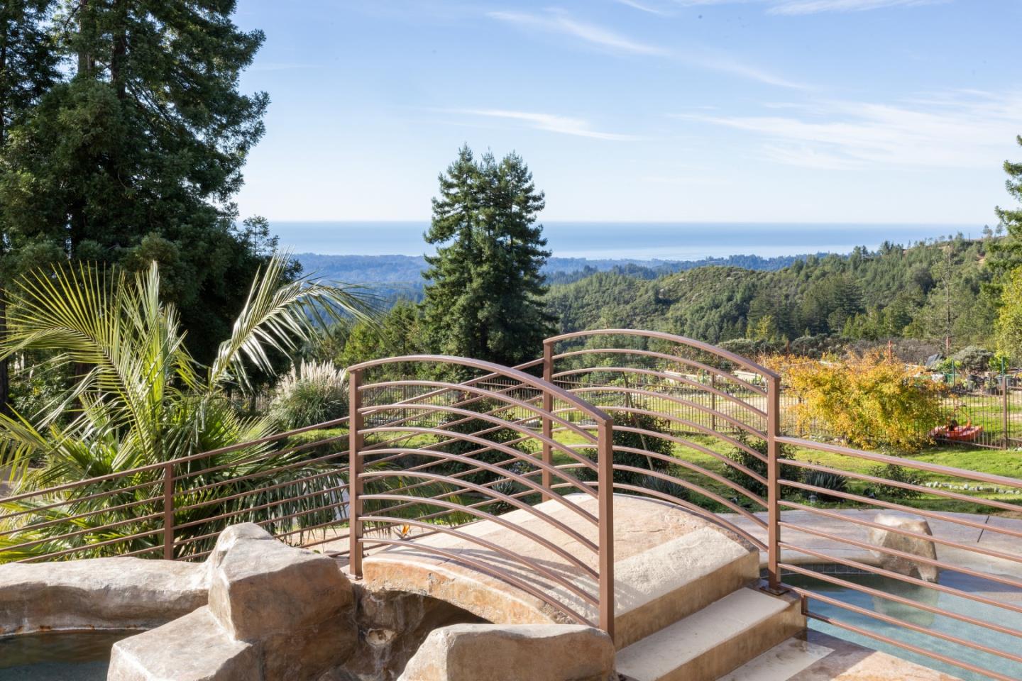1061 Summit Road Watsonville, CA 95076 - Photo 12 of 92 a view of a balcony with floor to ceiling windows and wooden fence