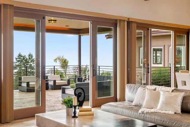 a view of a living room and a livingroom with furniture