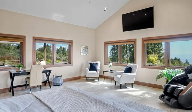 a outdoor living space with furniture and city view