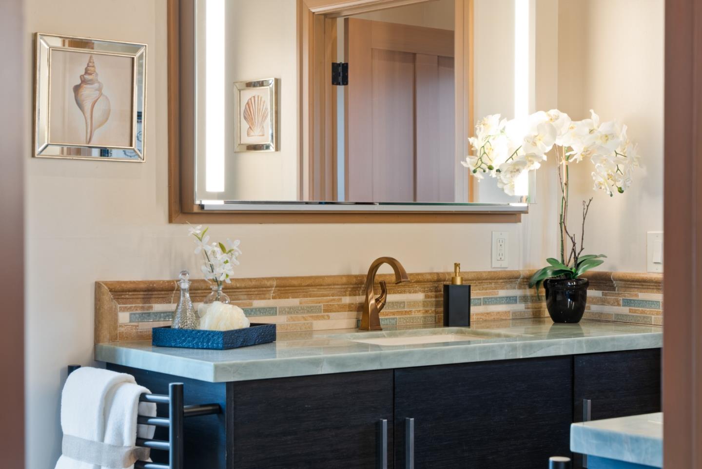 1061 Summit Road Watsonville, CA 95076 - Photo 40 of 84 a bathroom with a sink and a mirror