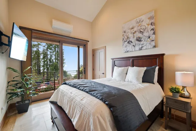 a view of a house with swimming pool and sitting area