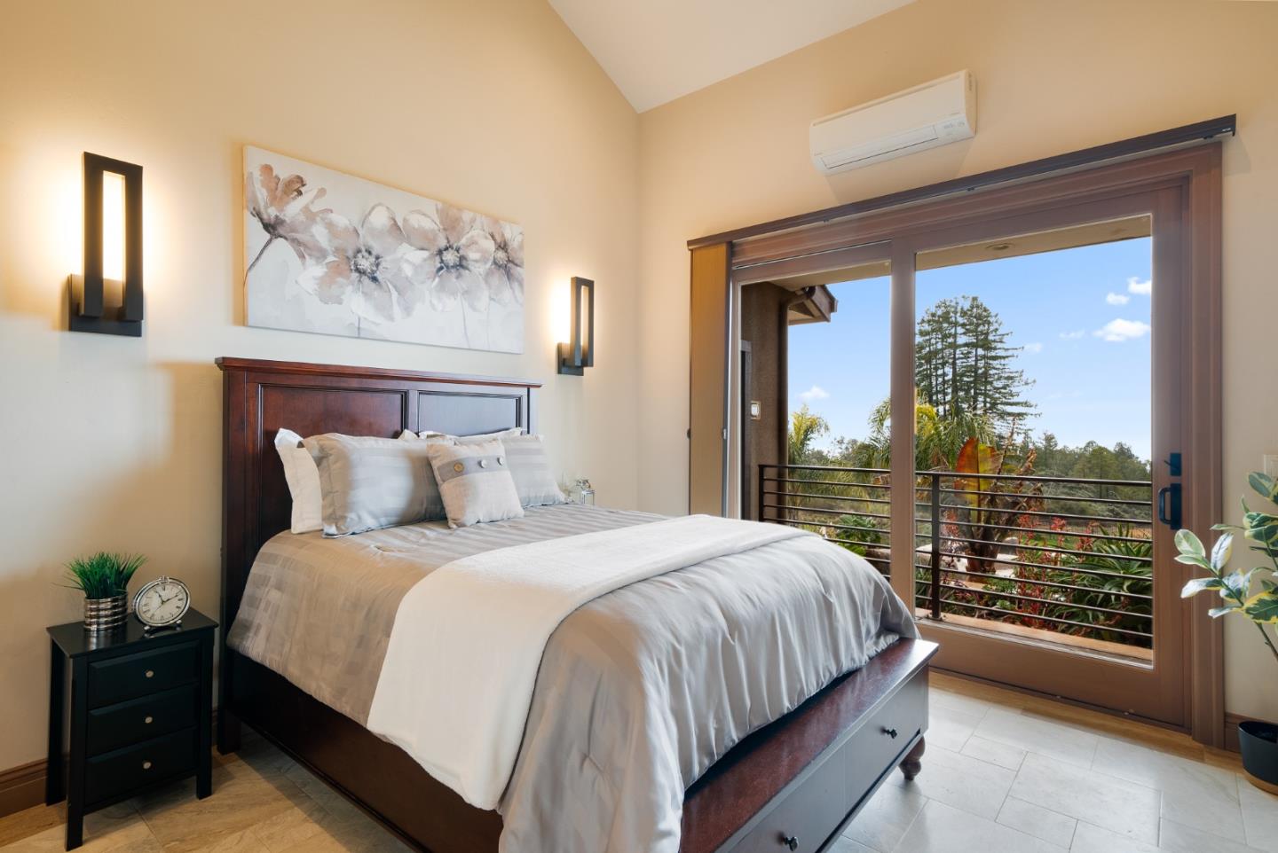 1061 Summit Road Watsonville, CA 95076 - Photo 44 of 84 a bedroom with a large bed and a painting on the wall