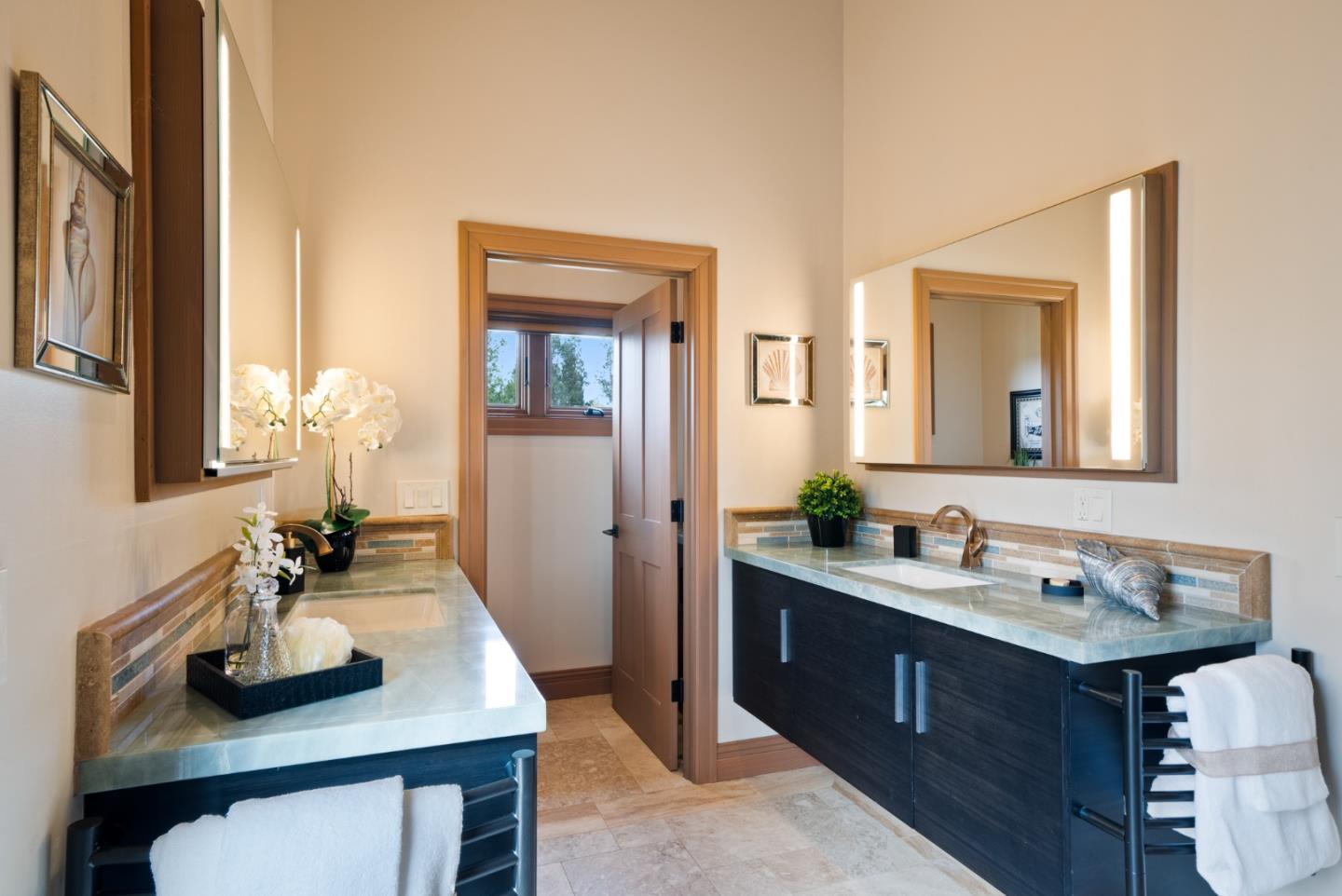 1061 Summit Road Watsonville, CA 95076 - Photo 47 of 92 a bathroom with a sink and a mirror