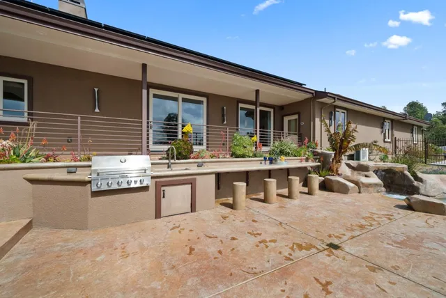 a house view with a outdoor space
