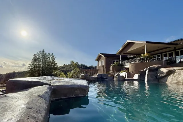 a living room with a table and a table