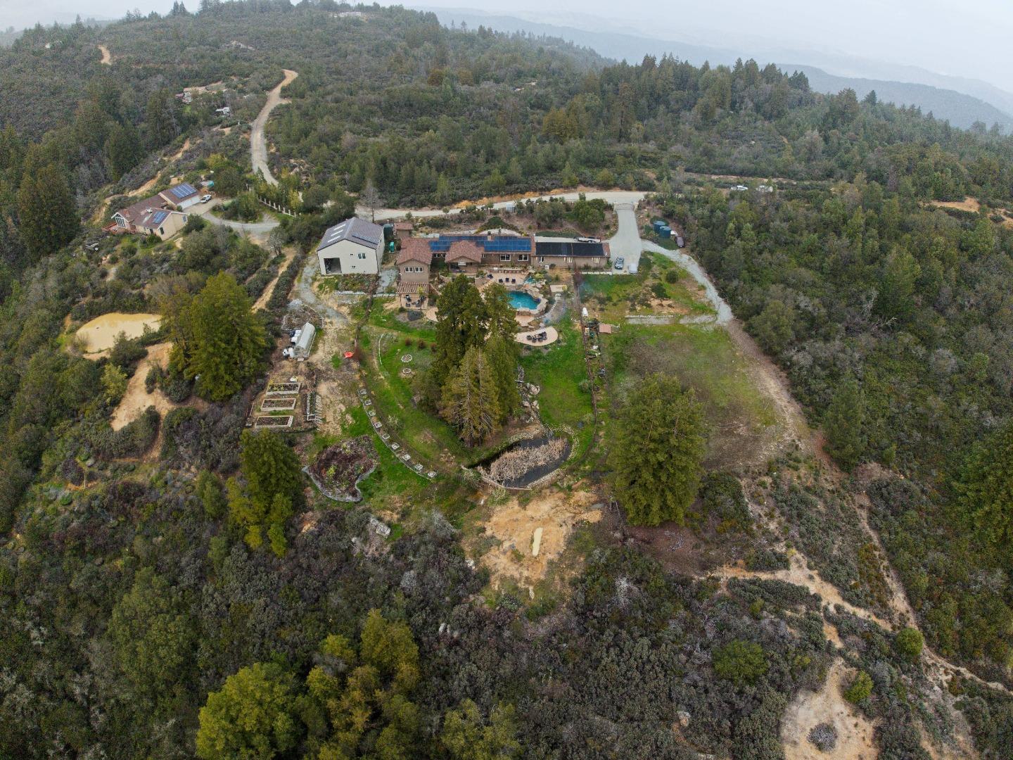 1061 Summit Road Watsonville, CA 95076 - Photo 83 of 84 a aerial view of a house with a yard and trees
