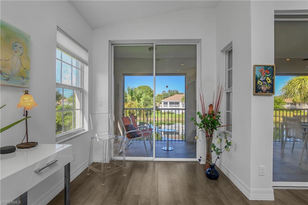 6867 Satinleaf Road South, Unit 201 Naples, FL 34109 - Photo 20 of 50 Morning room to the Lanai