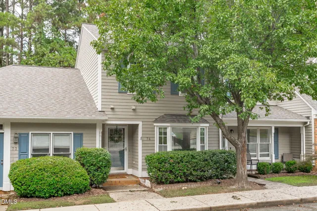 front view of a house with a yard