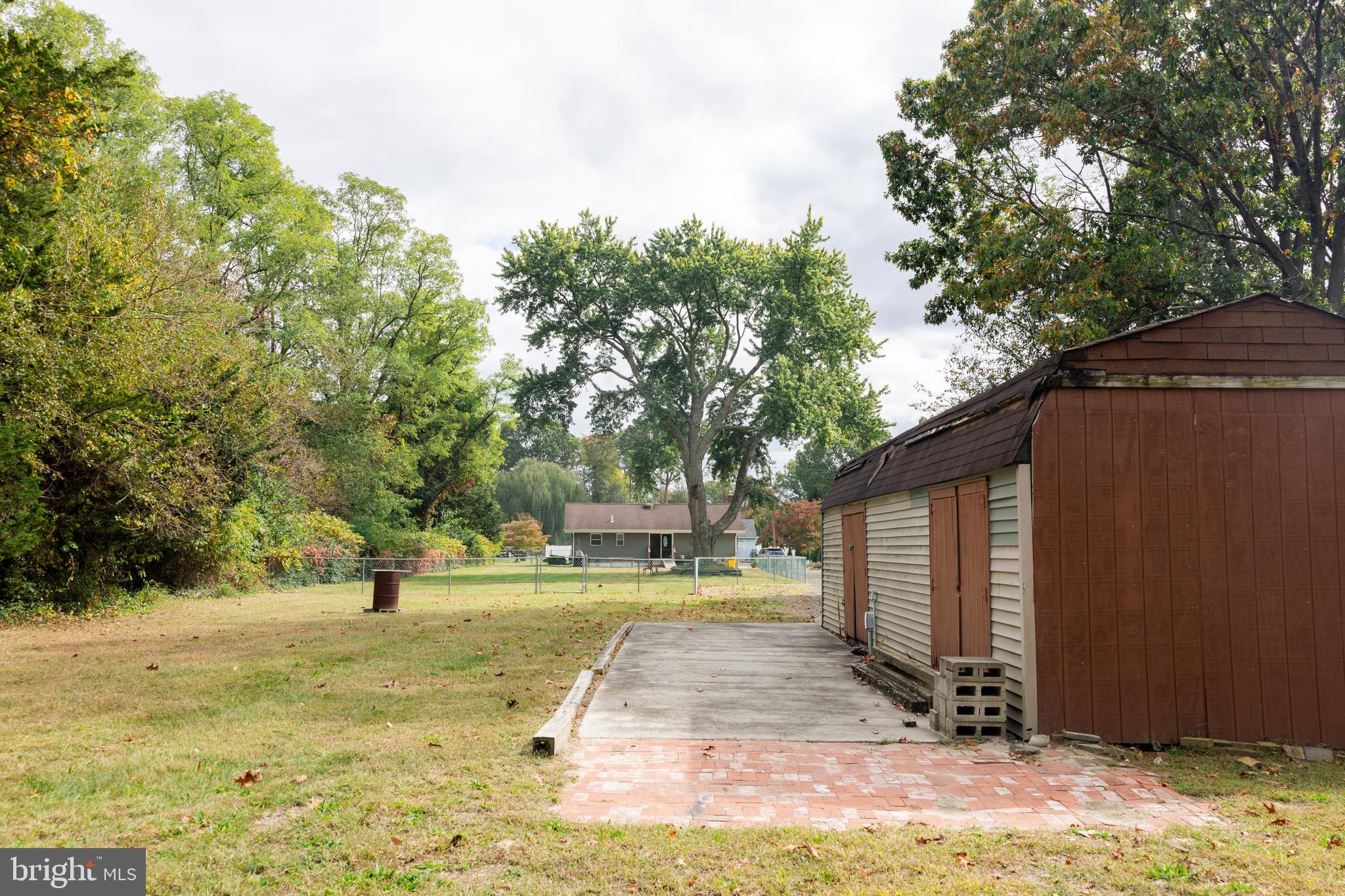 41 Plymouth Road Sicklerville, NJ 08081 - Photo 28 of 30 a view of a yard with plants and trees
