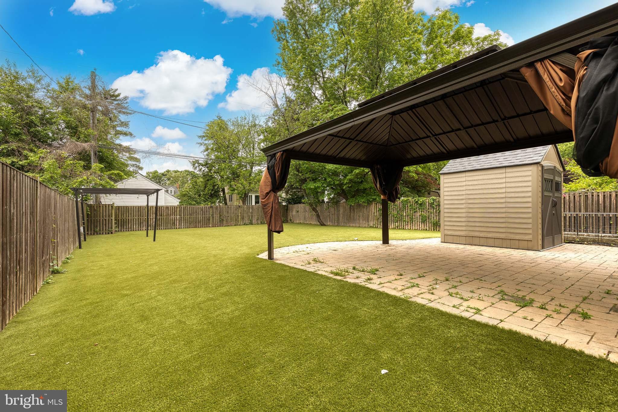 429 Cleveland Road Linthicum Heights, MD 21090 - Photo 35 of 38 Professional Turf Rear Yard
Paved Patio & Shed