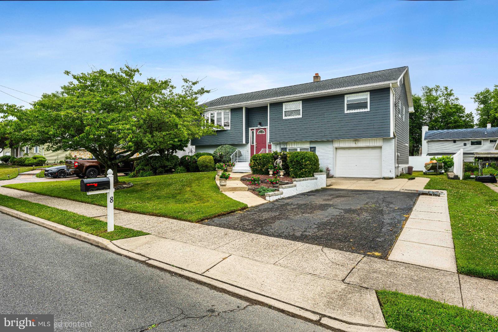 8 Dan Road Hamilton, NJ 08620 - Photo 3 of 49 Charming two-story home with lush greenery.