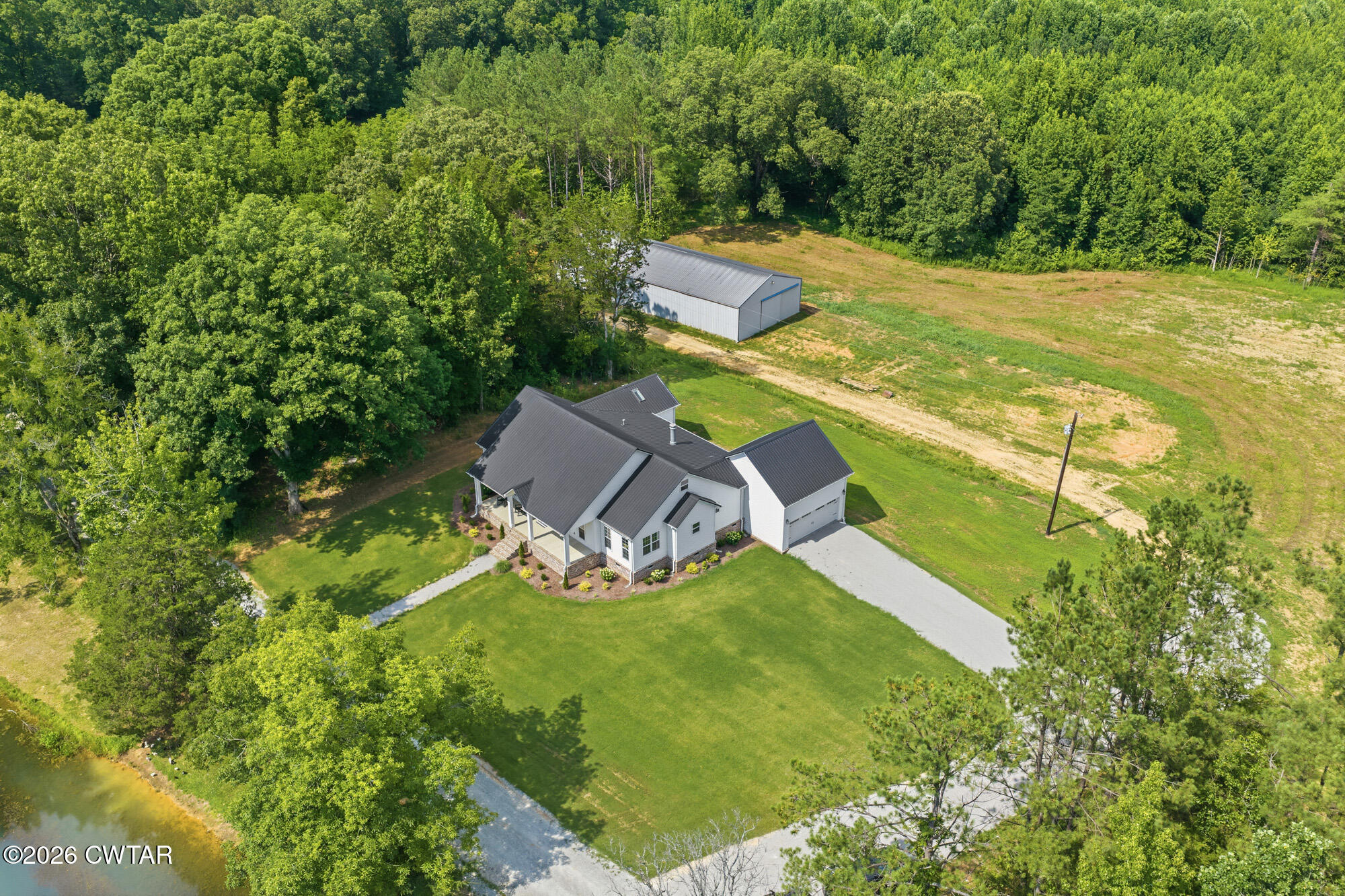 215 Benson Road Reagan, TN 38368 - Photo 4 of 65 DJI_20260702154349_0680_D