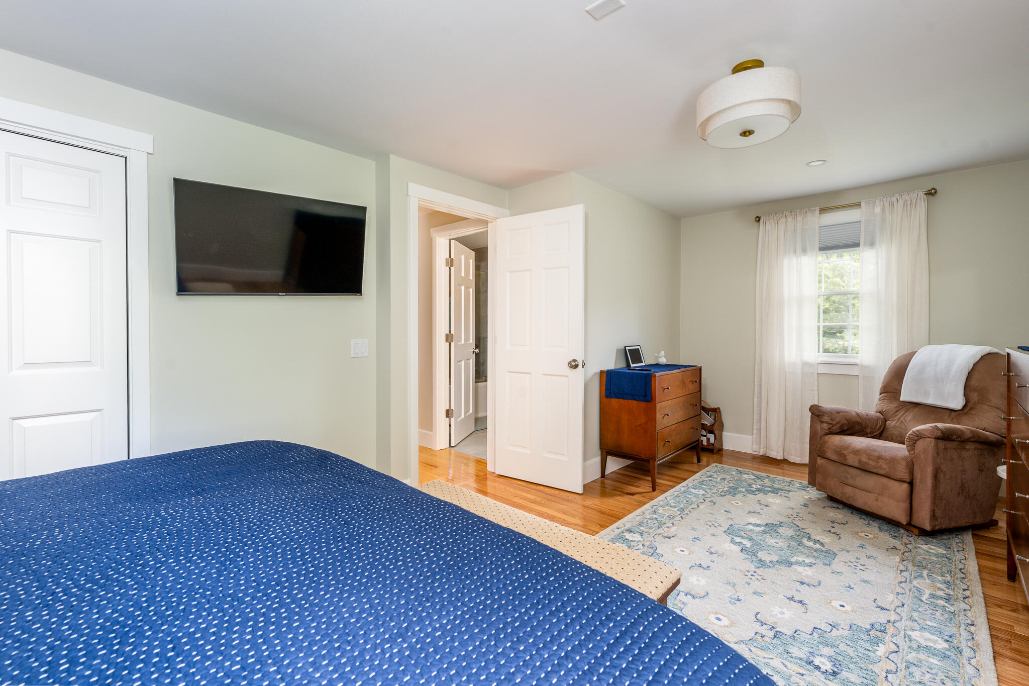 61 Angus Way Centerville, MA 02632 - Photo 28 of 59 a living room with furniture and a flat screen tv