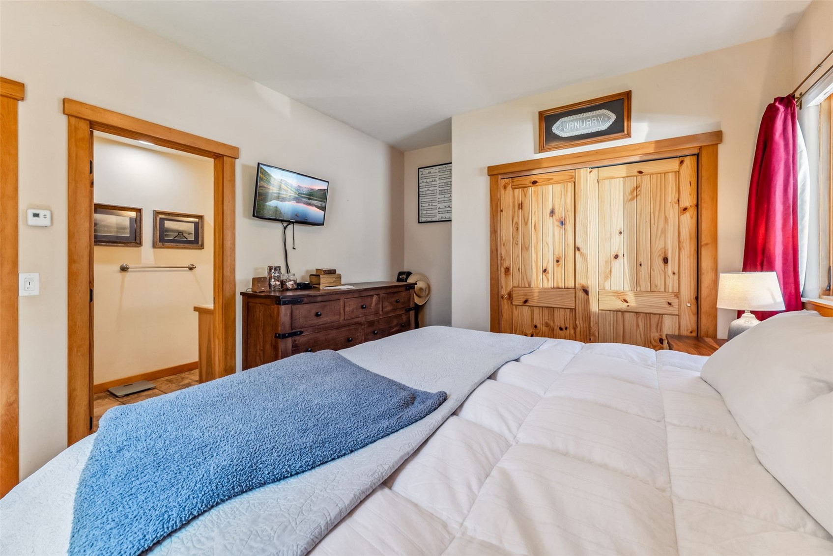 228 Glacier Ridge Road Alma, CO 80420 - Photo 35 of 50 a bedroom with a bed and a dresser