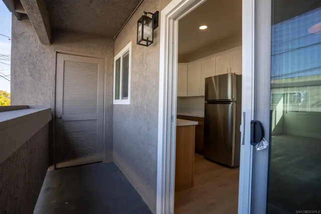 a kitchen with cabinets stainless steel appliances and a sink