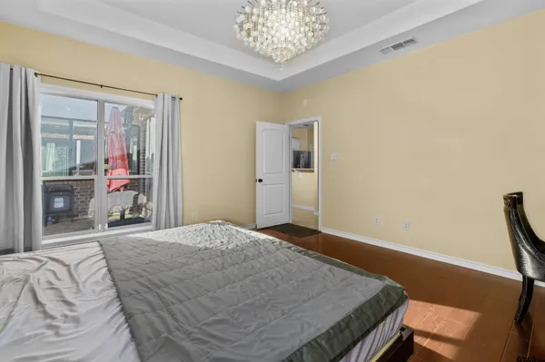 a bathroom with a granite countertop sink mirror and a