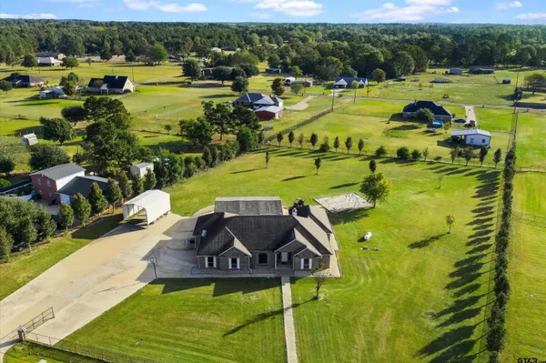 a view of a swimming pool with a lake view