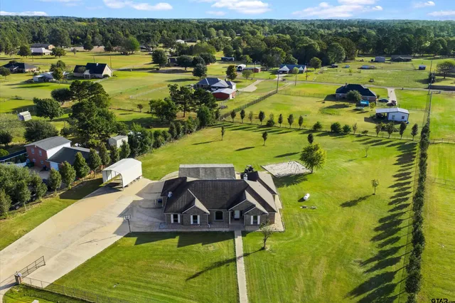 a view of a swimming pool with a lake view