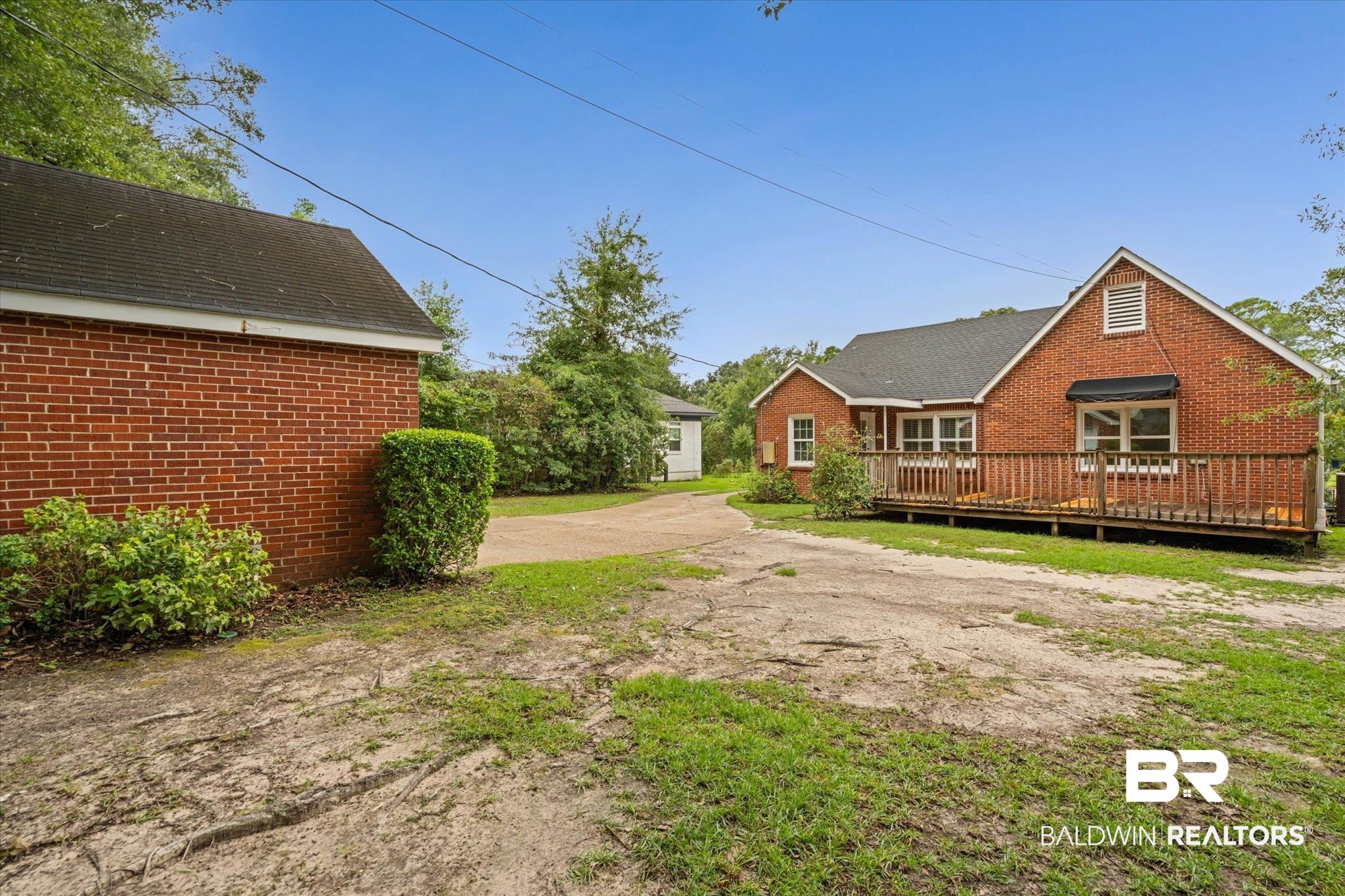 300 Woodlands Avenue Mobile, AL 36607 - Photo 17 of 23 View of yard with a deck