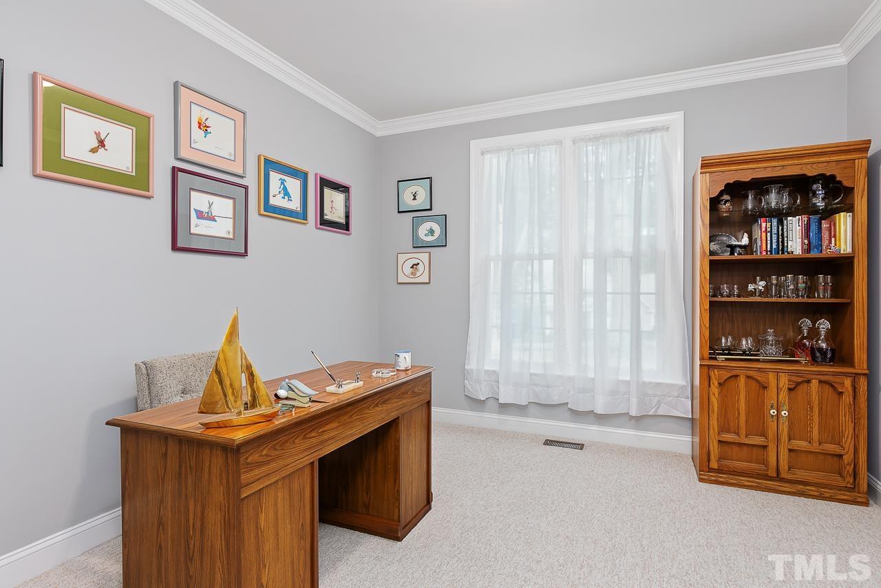 2113 Tibwin Drive Raleigh, NC 27606 - Photo 12 of 30 Spacious main floor office tucked away in a quiet private corner of the home.